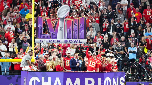Feb 11, 2024; Paradise, Nevada, USA; Kansas City Chiefs quarterback Patrick Mahomes (15) hoists the Vince Lombardi Trophy after defeating the San Francisco 49ers in Super Bowl LVIII at Allegiant Stadium. Mandatory Credit: Stephen R. Sylvanie-USA TODAY Sports  